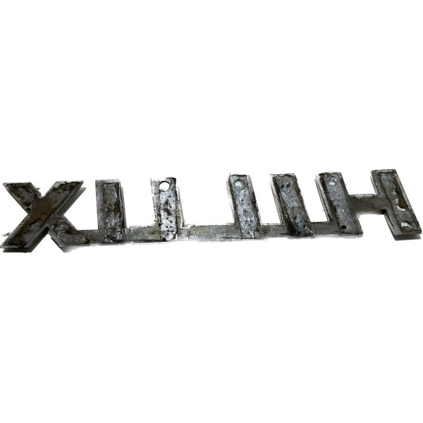 Emblema Hilux Tampa Traseira Hilux 2016/22 Cx349